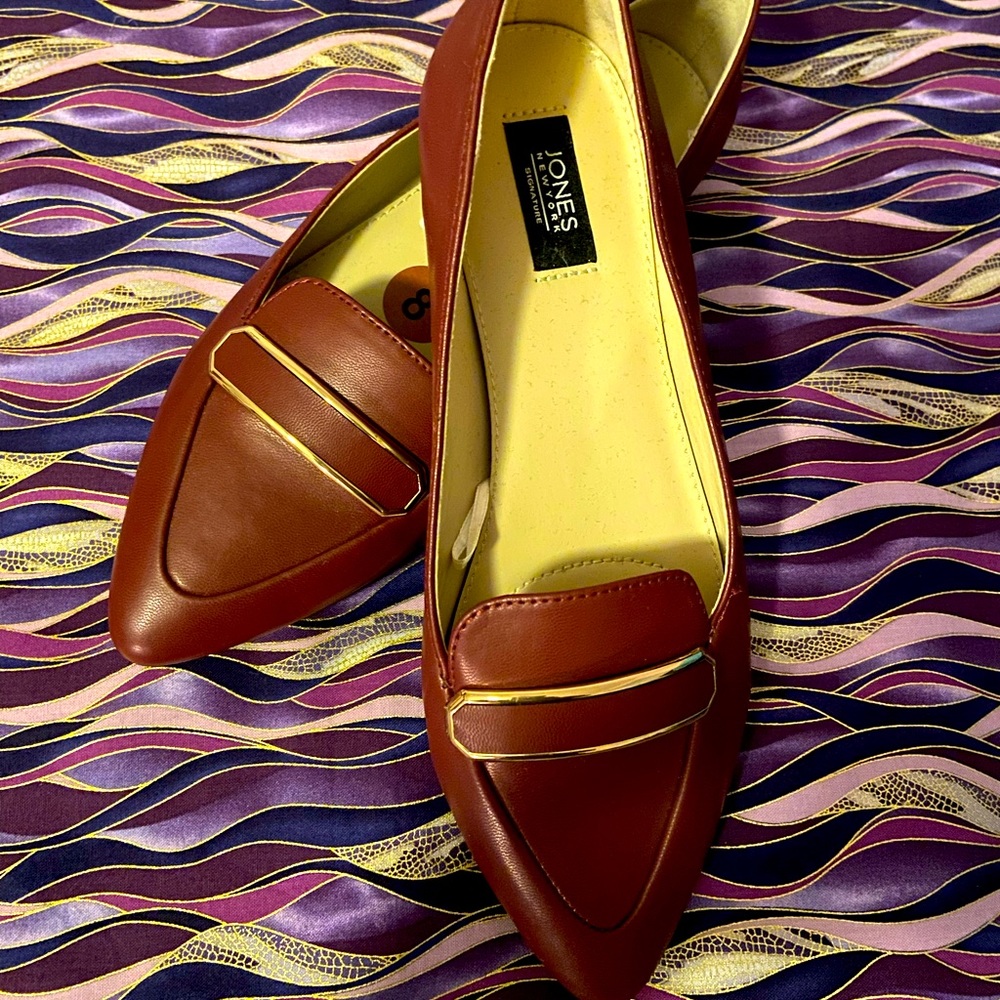 Jones New York light burgundy with gold detail on top of loafer.